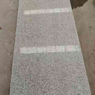 滨州芝麻白光面毛板