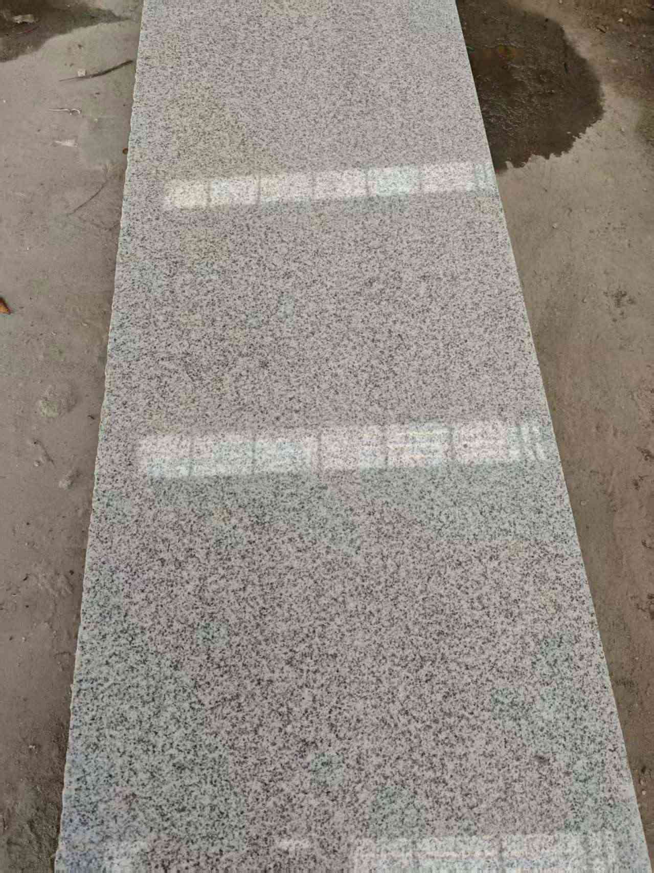 滨州芝麻白光面毛板